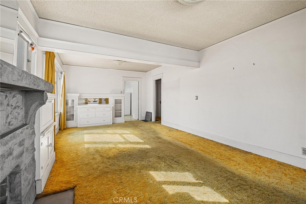 659 West 3rd Street San Pedro, CA 90731 - Photo 8 of 38 a view of empty room with kitchen