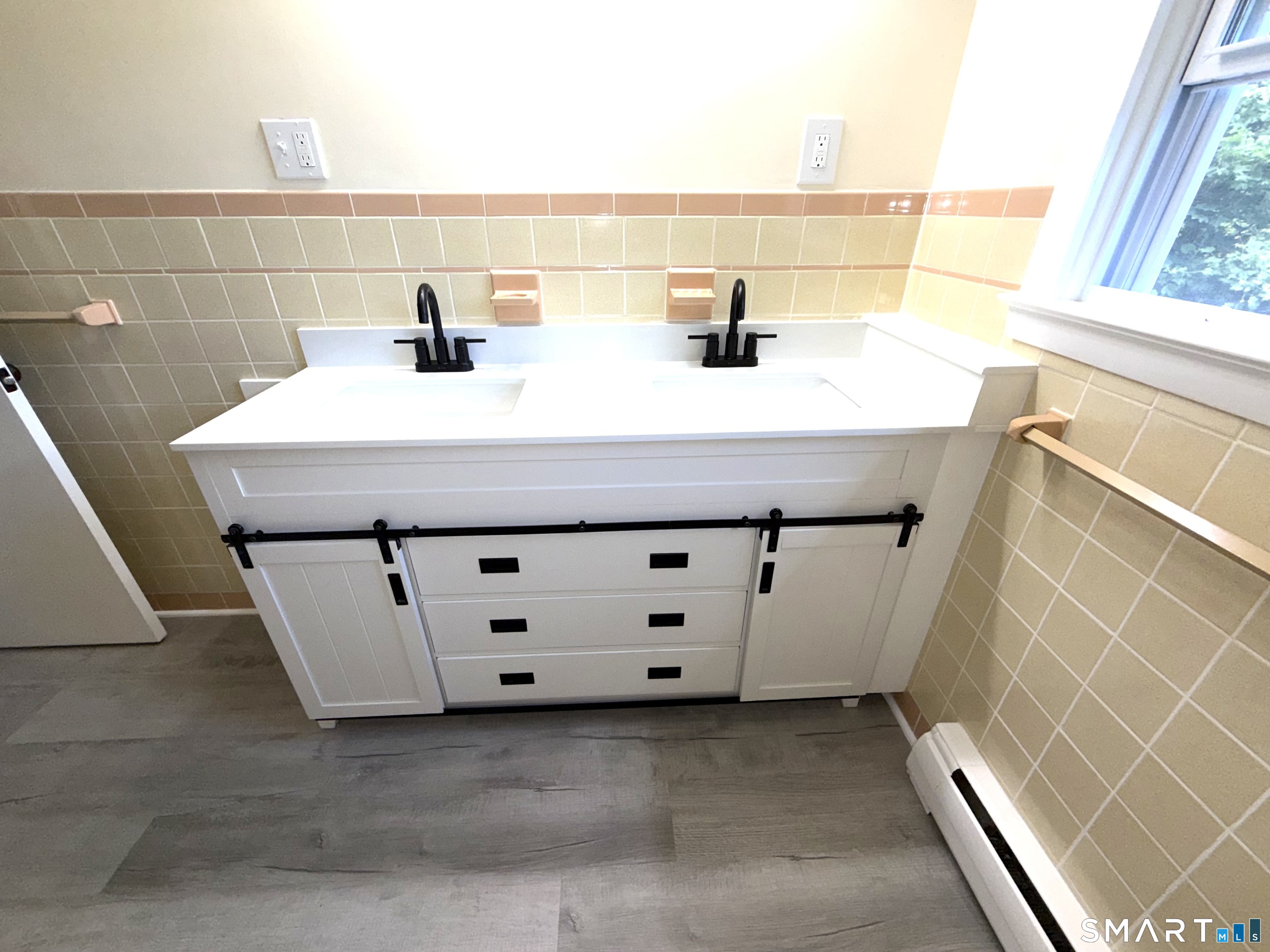 341 Harland Road Norwich, CT 06360 - Photo 21 of 29 a bathroom with a sink and a mirror