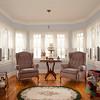 121 Woodside Road Riverside, IL 60546 - Photo 2 of 15 a living room with couches and a potted plant