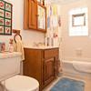 121 Woodside Road Riverside, IL 60546 - Photo 14 of 15 a bathroom with a sink and a mirror