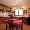 121 Woodside Road Riverside, IL 60546 - Photo 8 of 15 a view of a dining room with furniture and a chandelier