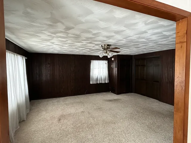 an empty room with windows