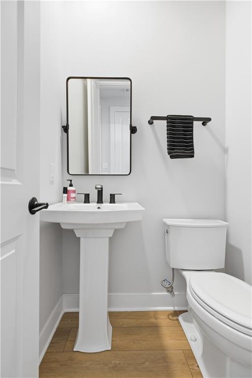 247 Limehouse Road Cranberry Township, PA 16066 - Photo 15 of 43 a bathroom with a sink toilet and mirror