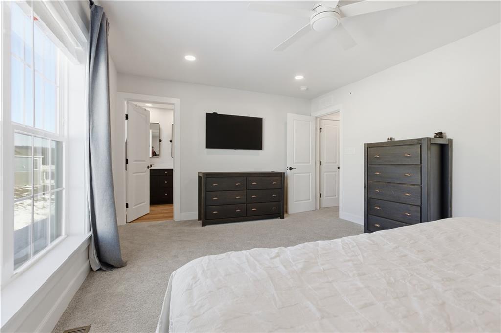 247 Limehouse Road Cranberry Township, PA 16066 - Photo 23 of 43 a bedroom with a bed and a television
