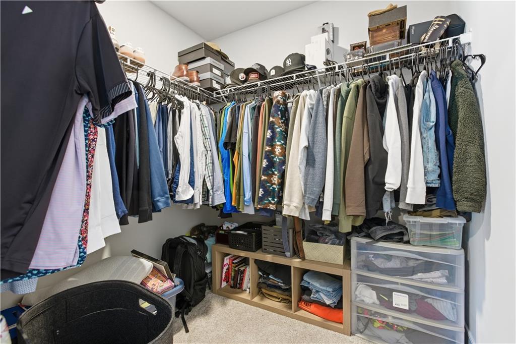 247 Limehouse Road Cranberry Township, PA 16066 - Photo 26 of 43 a view of walk in closet with clothes