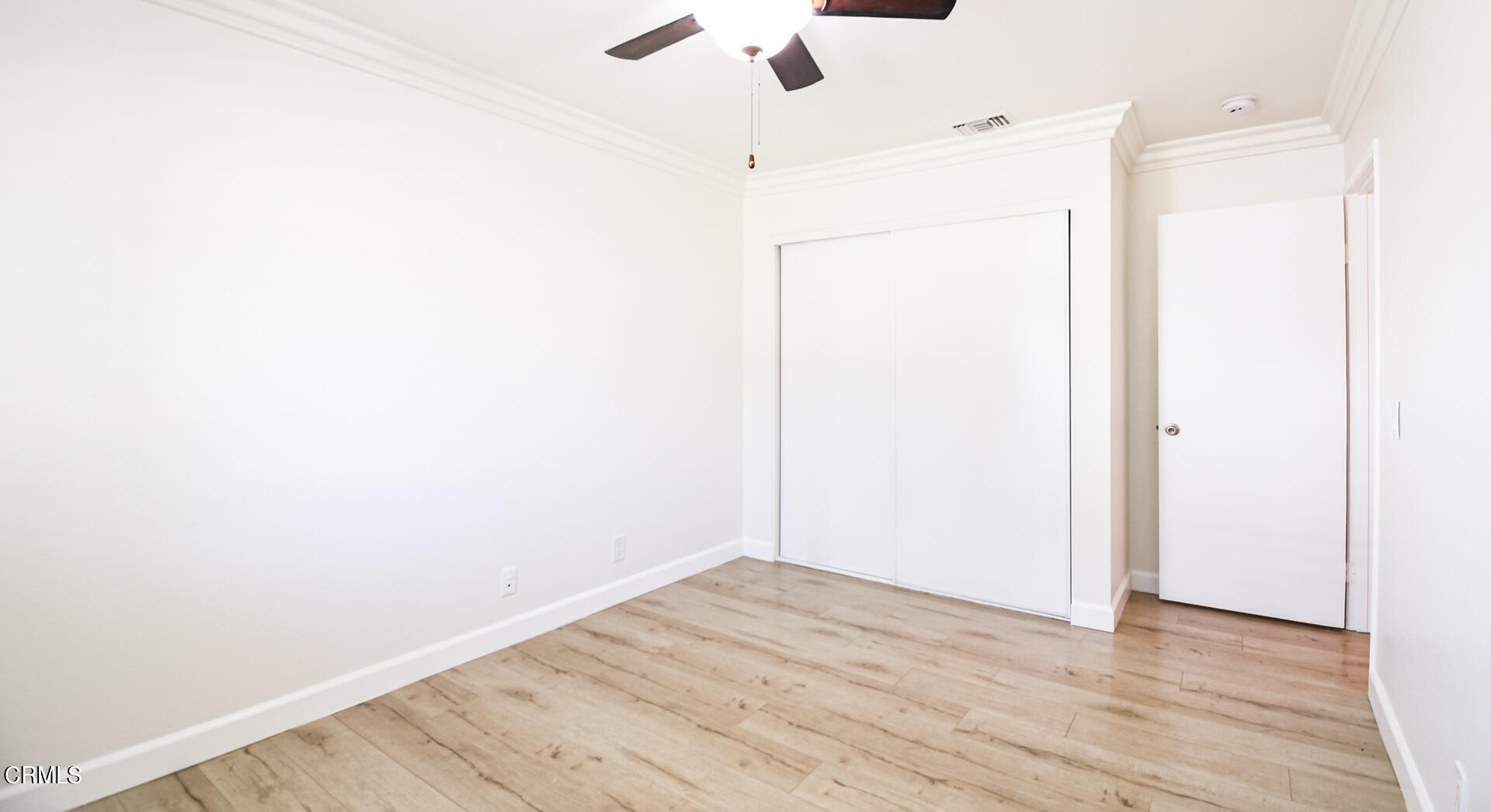 9310 Friant Street Rancho Cucamonga, CA 91730 - Photo 17 of 26 a view of a room with wooden floor