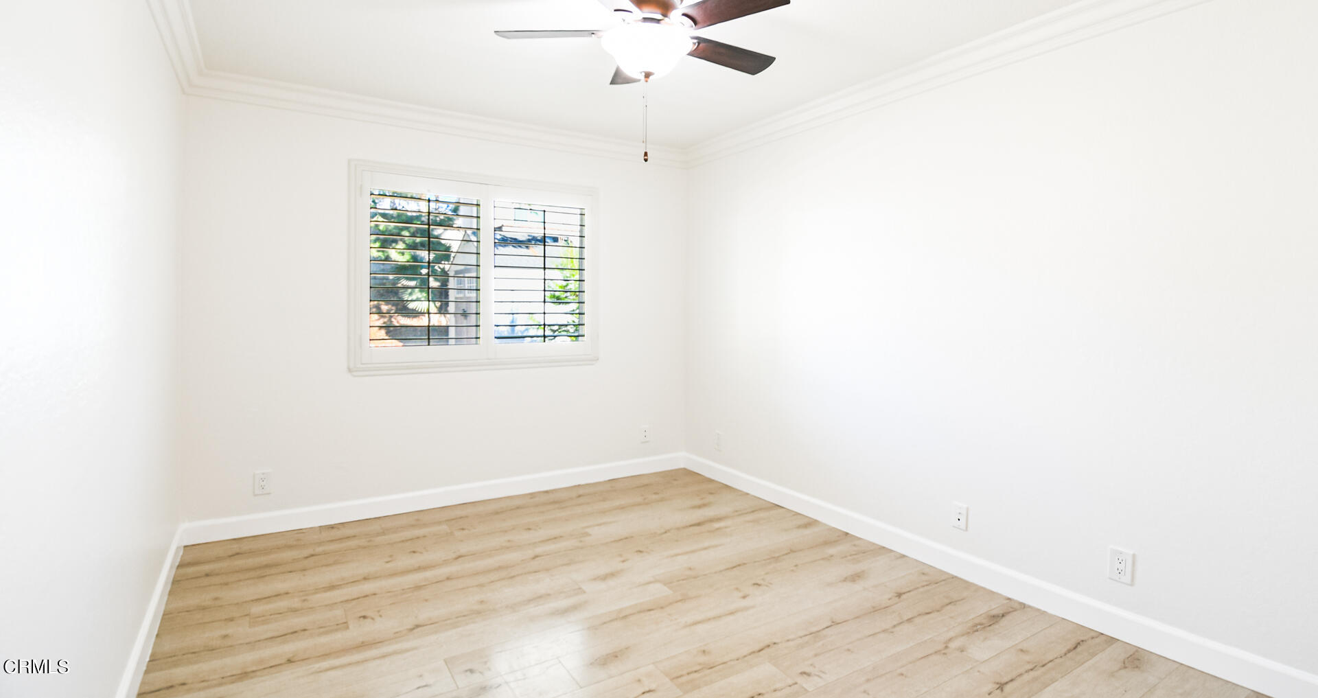 9310 Friant Street Rancho Cucamonga, CA 91730 - Photo 20 of 26 an empty room with a window and a fan
