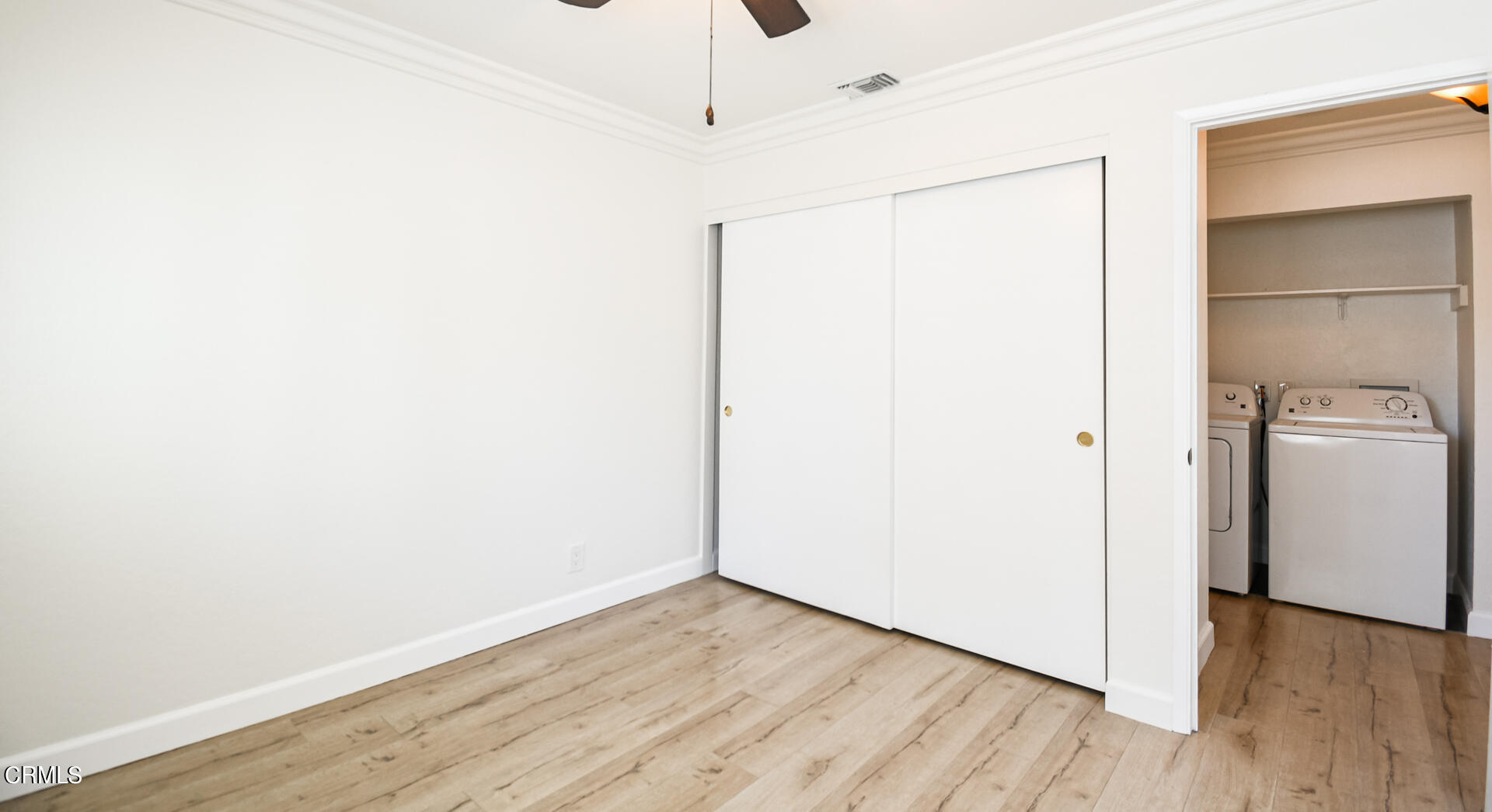 9310 Friant Street Rancho Cucamonga, CA 91730 - Photo 21 of 26 a view of a room with wooden floor