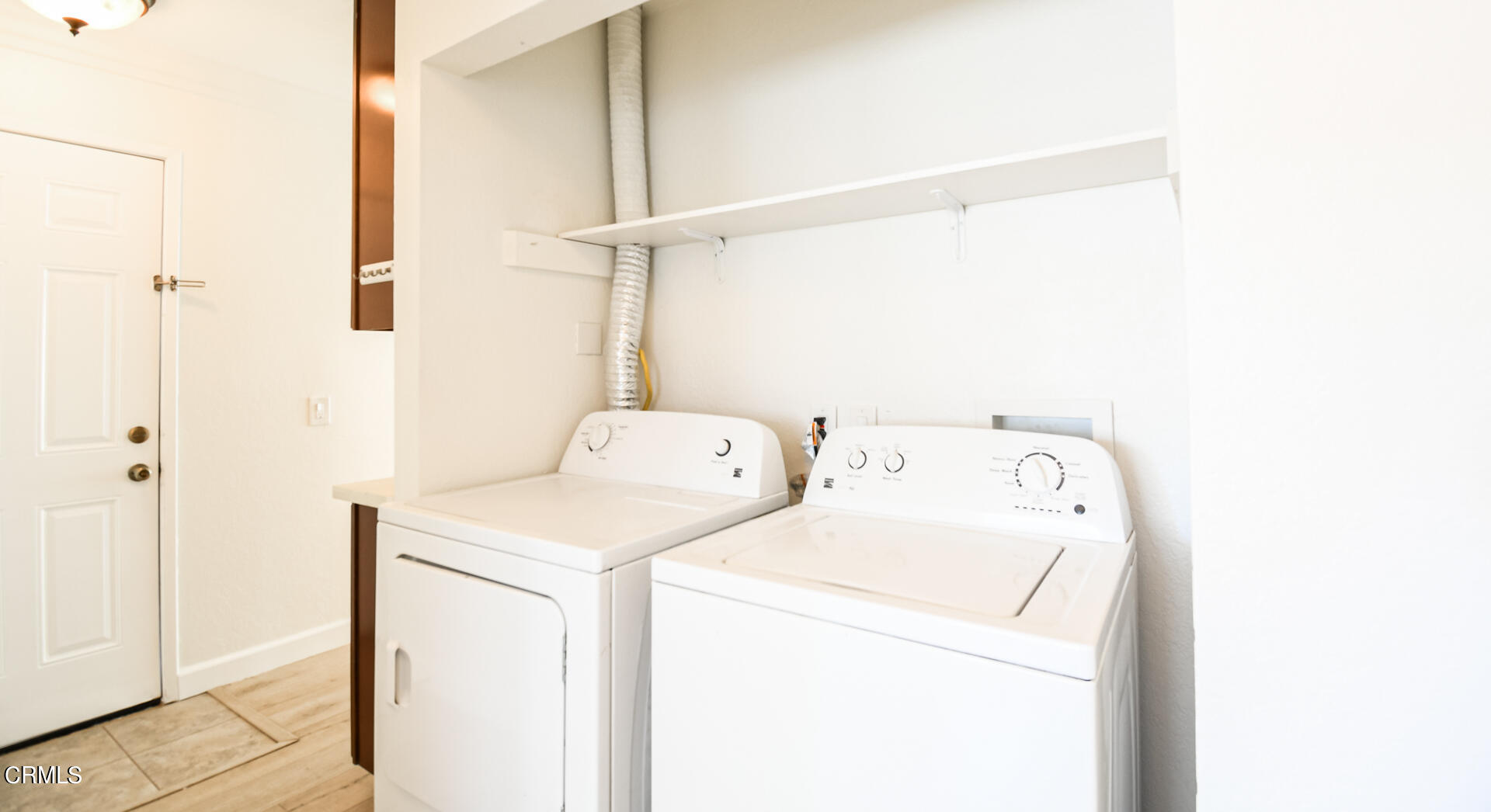 9310 Friant Street Rancho Cucamonga, CA 91730 - Photo 22 of 26 a utility room with dryer and washer