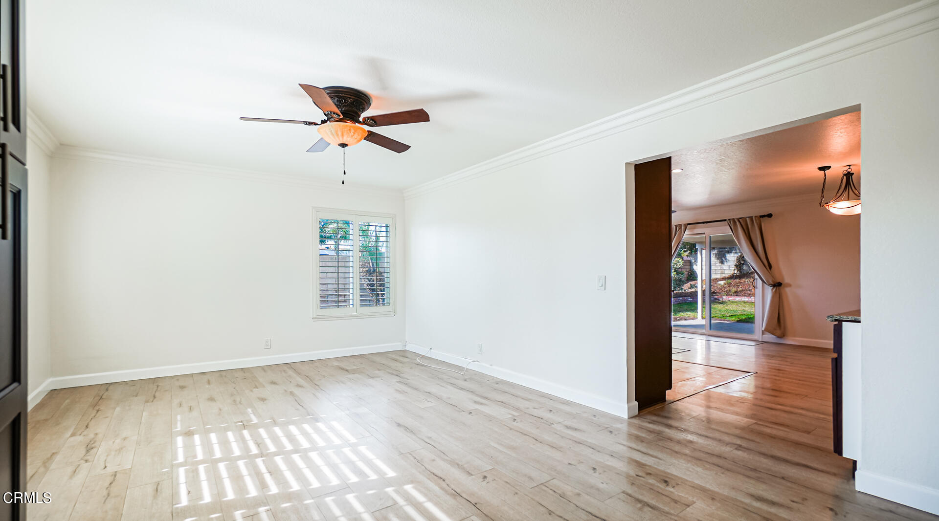 9310 Friant Street Rancho Cucamonga, CA 91730 - Photo 3 of 26 wooden floor in an empty room with a window