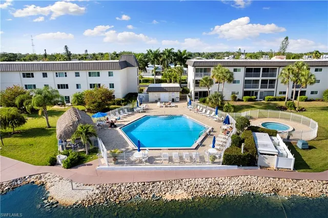 a view of a swimming pool with a patio