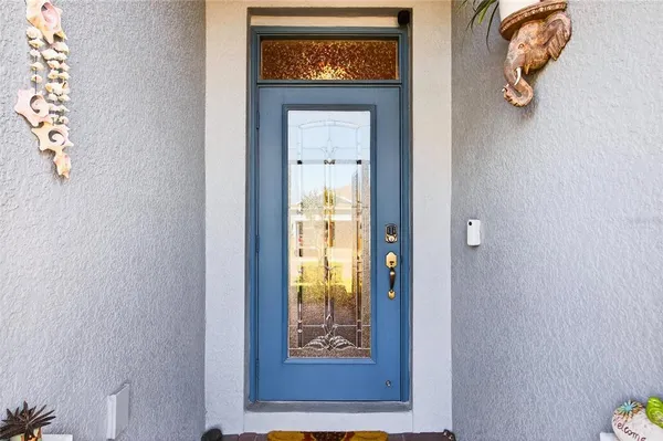 a view of a hallway with wooden door