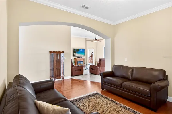 a living room with furniture and a couch