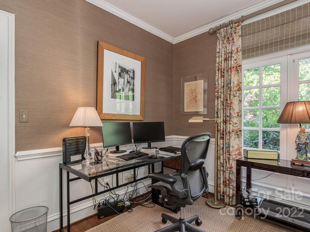 1931 Queens Road Charlotte, NC 28207 - Photo 12 of 23 a workspace with furniture and a window