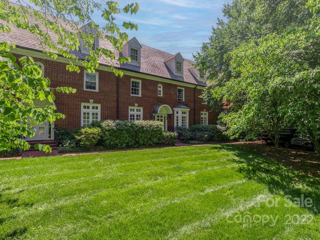1931 Queens Road Charlotte, NC 28207 - Photo 3 of 23 a front view of a house with garden