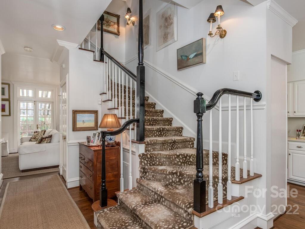 1931 Queens Road Charlotte, NC 28207 - Photo 4 of 23 a view of entryway and hall with wooden floor