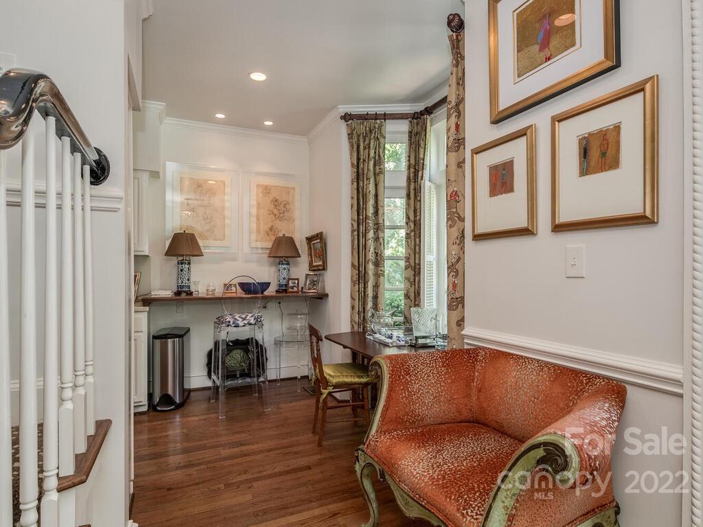 1931 Queens Road Charlotte, NC 28207 - Photo 6 of 23 a living room with furniture and a fireplace