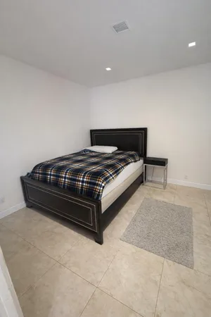 a view of bedroom with furniture