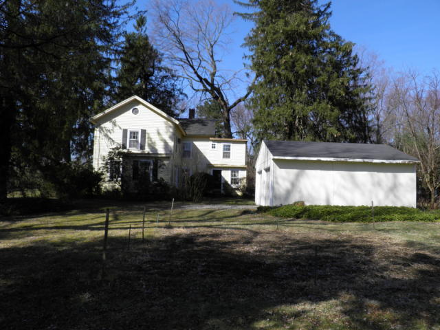 12 Gerdes Road New Canaan, CT 06840 - Photo 3 of 6 a view of a house with a yard