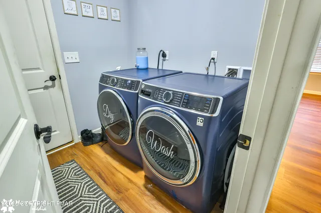 a spacious bedroom with a bed and window