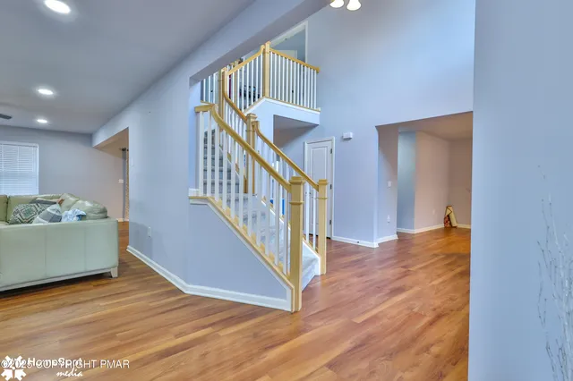a view of entryway with wooden floor