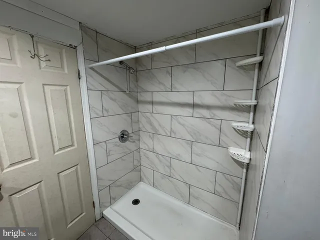 a bathroom with sink and mirror