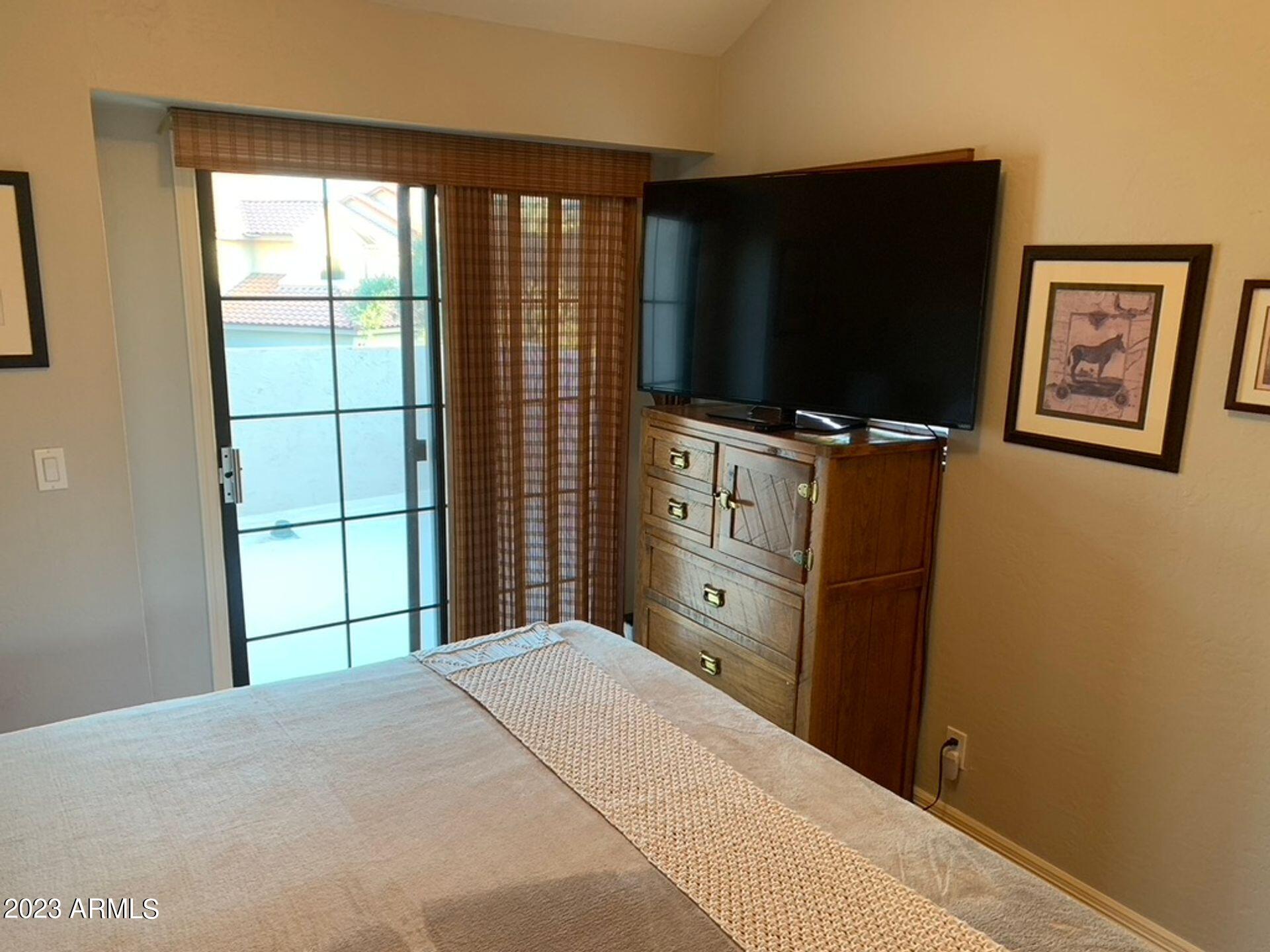 9705 East Mountain View Road, Unit 1003 Scottsdale, AZ 85258 - Photo 11 of 12 1003 guest bedroom _1