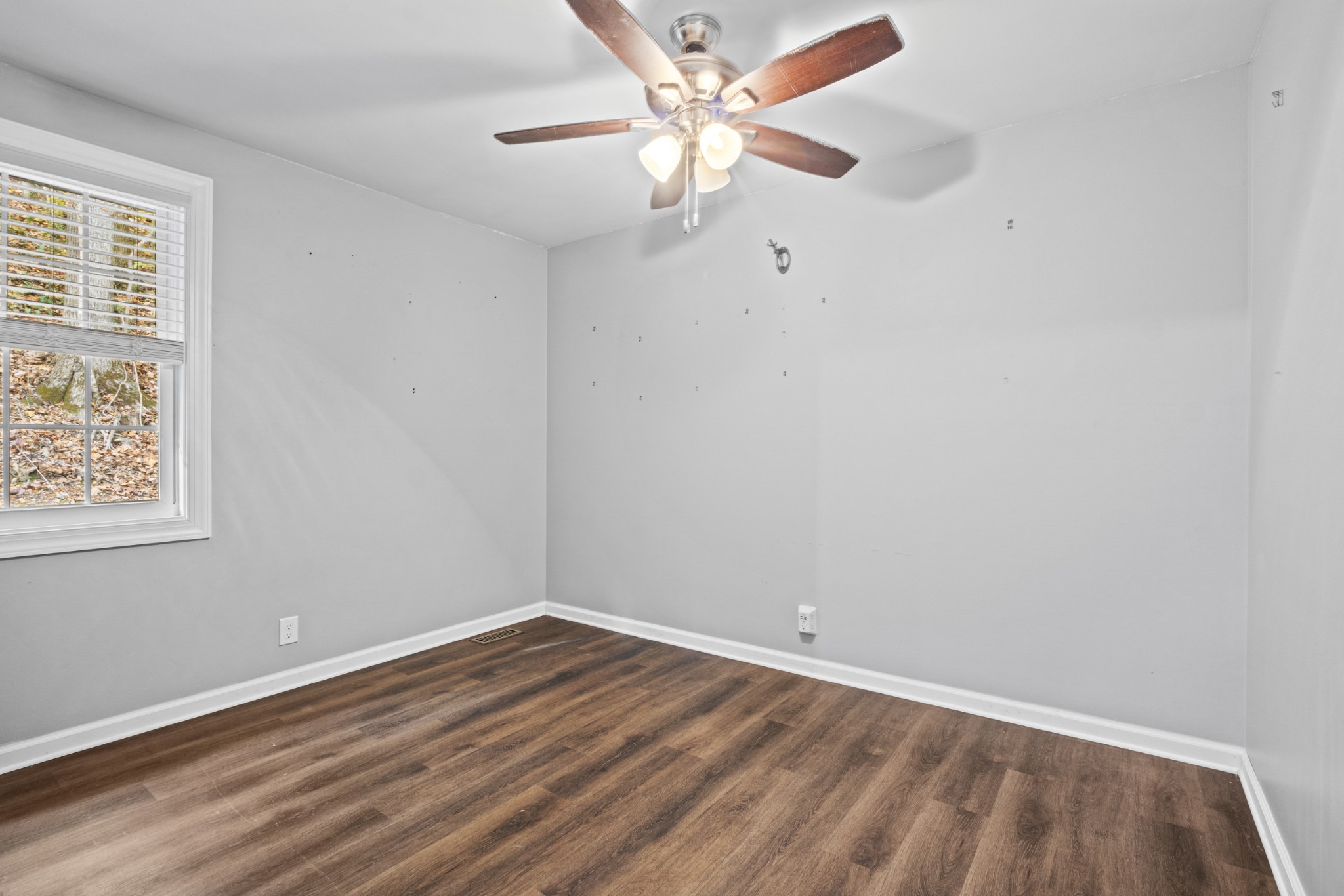 1420 Indian Springs Road Pegram, TN 37143 - Photo 21 of 39 an empty room with a window and a fan