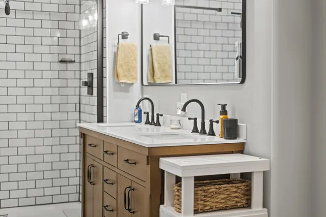 a close view of a sink a faucet and a bathroom