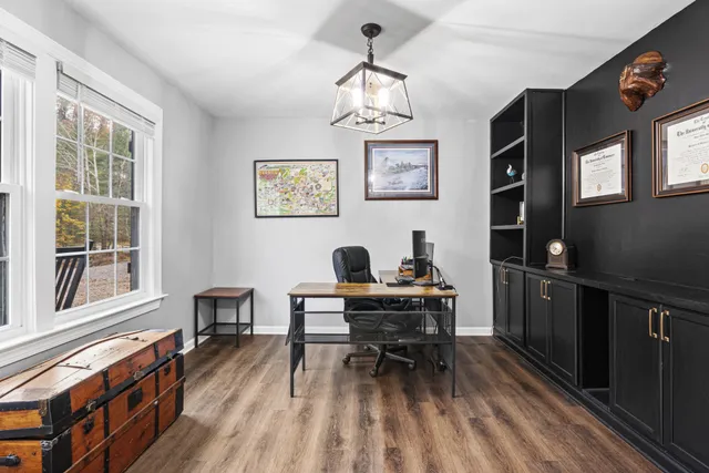 a workspace with wooden floor