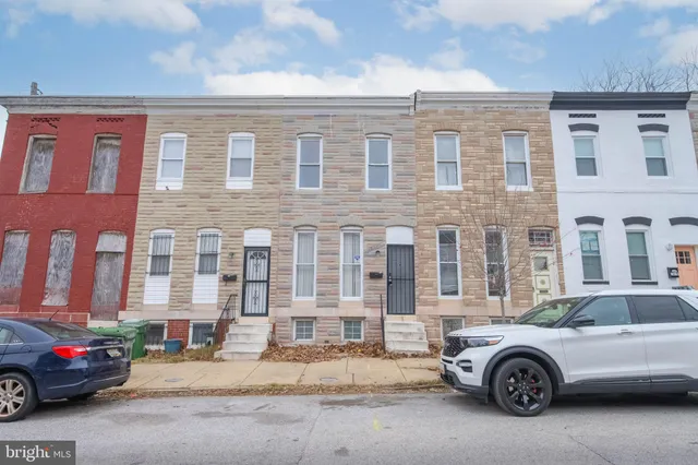 a car parked in front of a building
