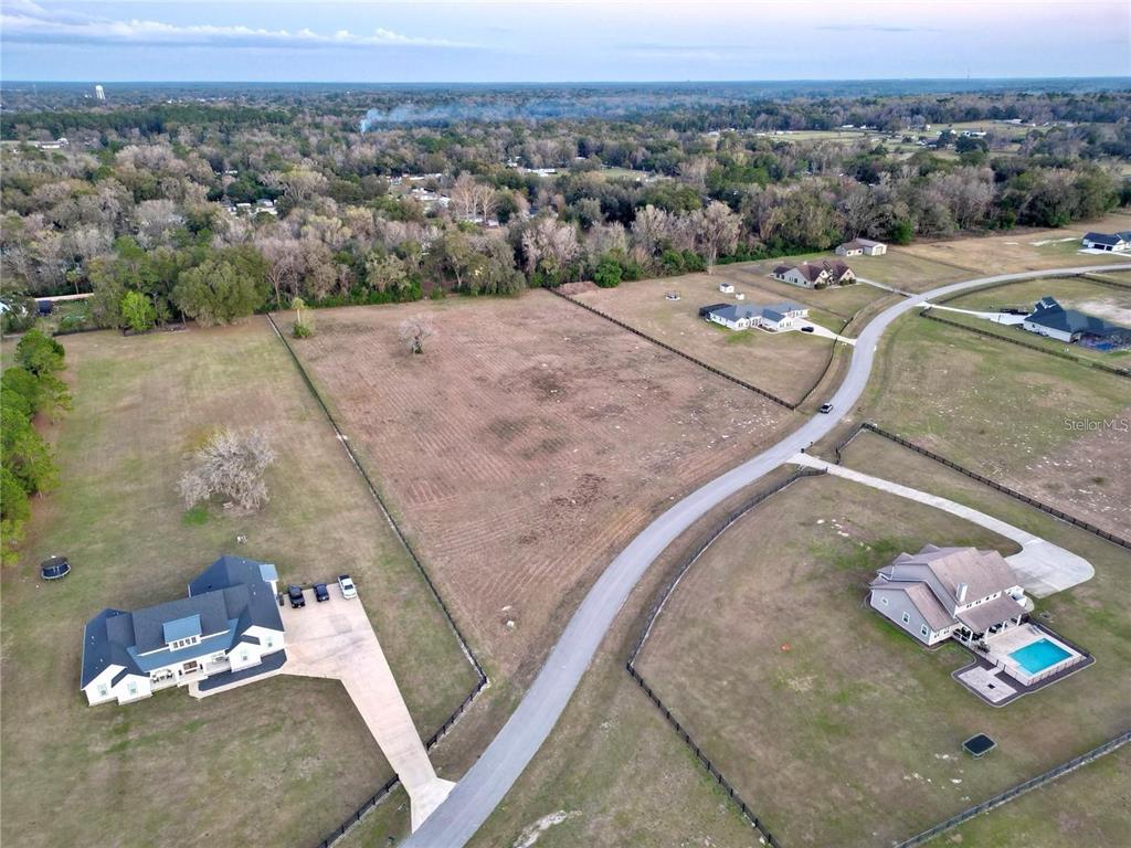 Tbd Southeast 37th Terrace Belleview, FL 34420 - Photo 10 of 11 an aerial view of a house with a yard
