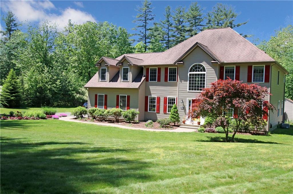 421 Long Meadow Road Middlebury, CT 06762 - Photo 1 of 1 a front view of house with yard and green space