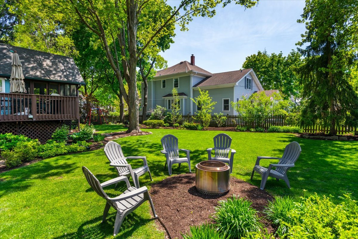 23 Columbia Street Naperville, IL 60540 - Photo 75 of 94 a view of a house with backyard sitting area and garden