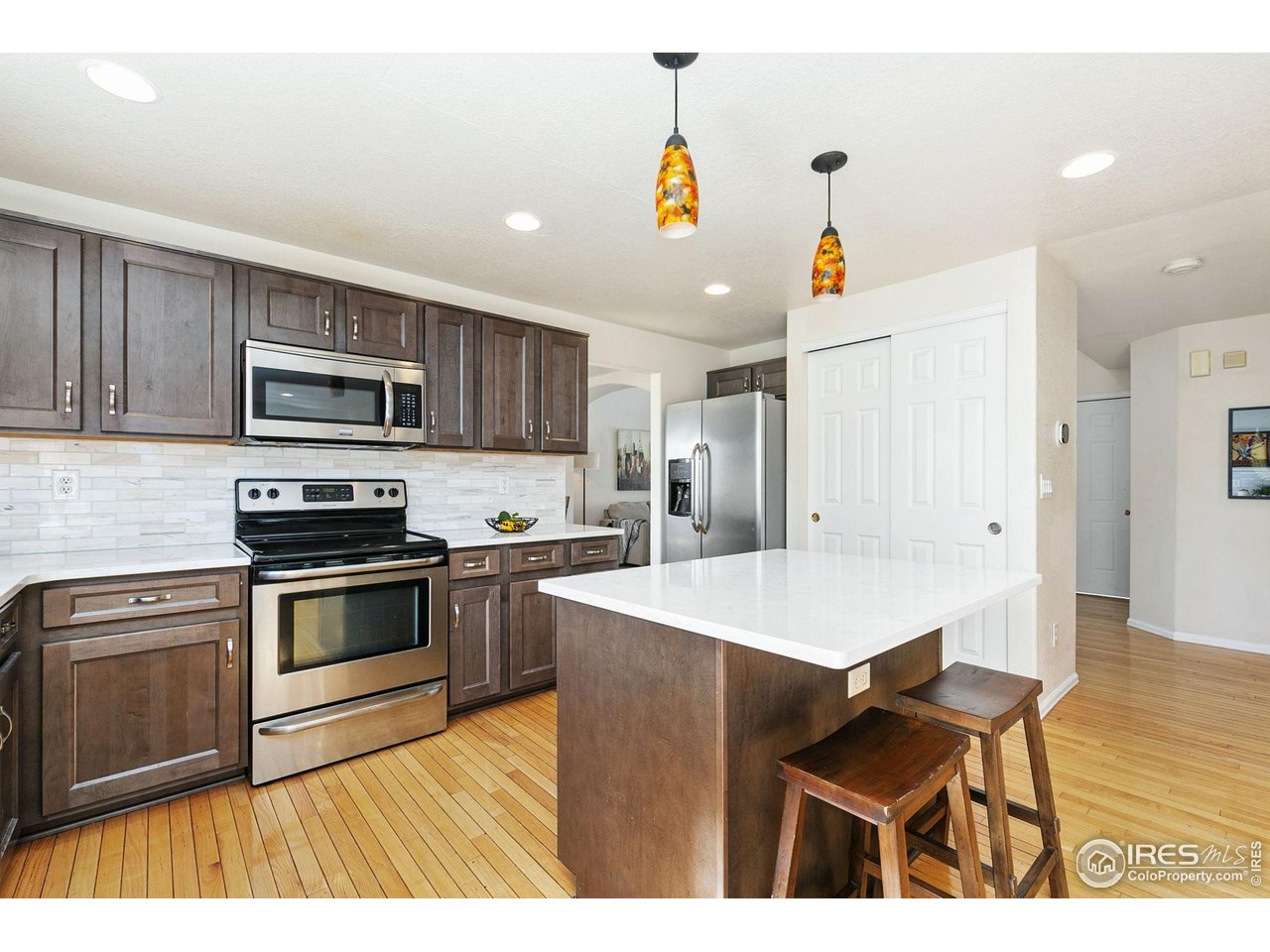 7202 Avondale Road Fort Collins, CO 80525 - Photo 8 of 29 Quartz Counters and Stainless Applainces
