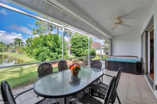 a outdoor dining space with furniture and garden view