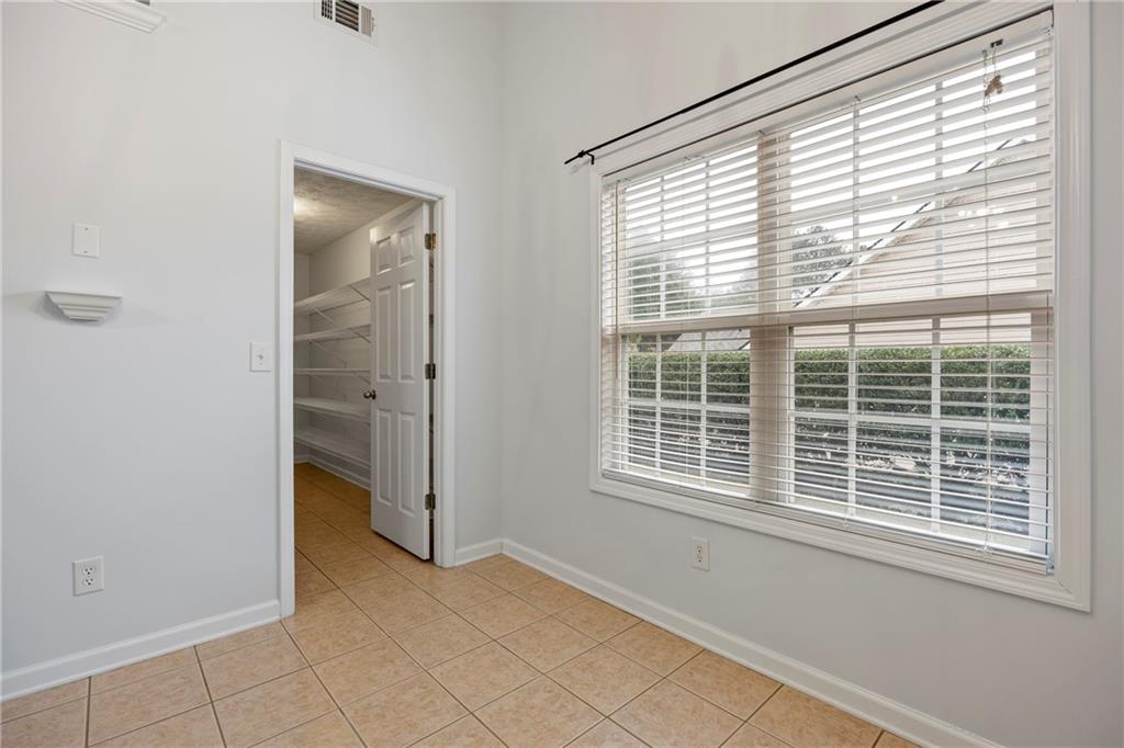 3768 North Sharon Church Road Loganville, GA 30052 - Photo 14 of 58 a view of an empty room with a window