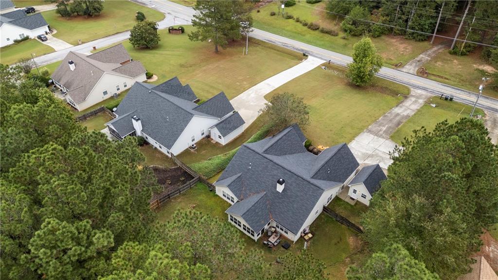 3768 North Sharon Church Road Loganville, GA 30052 - Photo 50 of 58 an aerial view of residential house with outdoor space and swimming pool