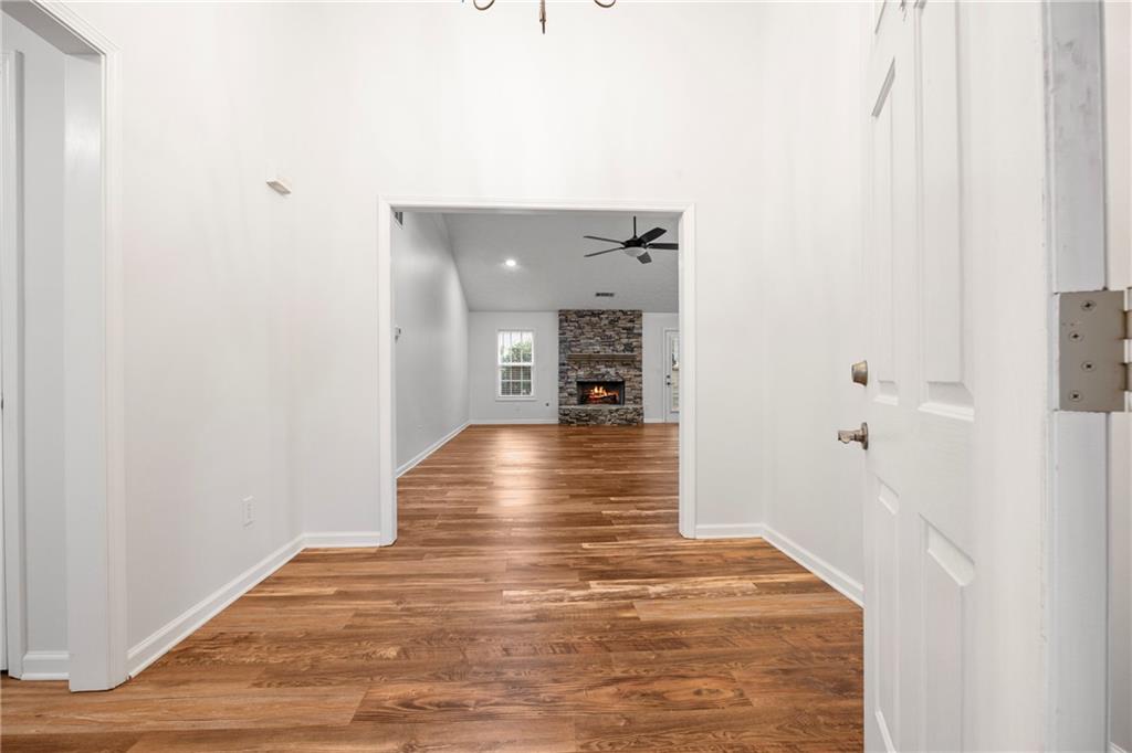 3768 North Sharon Church Road Loganville, GA 30052 - Photo 5 of 58 a view of a living room with a wooden floor