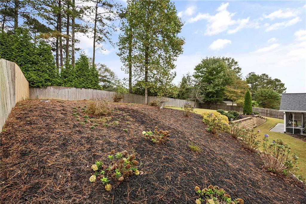 3768 North Sharon Church Road Loganville, GA 30052 - Photo 55 of 58 a view of backyard with outdoor space