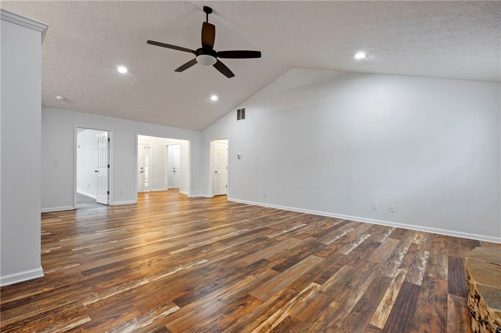 3768 North Sharon Church Road Loganville, GA 30052 - Photo 10 of 58 a view of a room with a ceiling fan