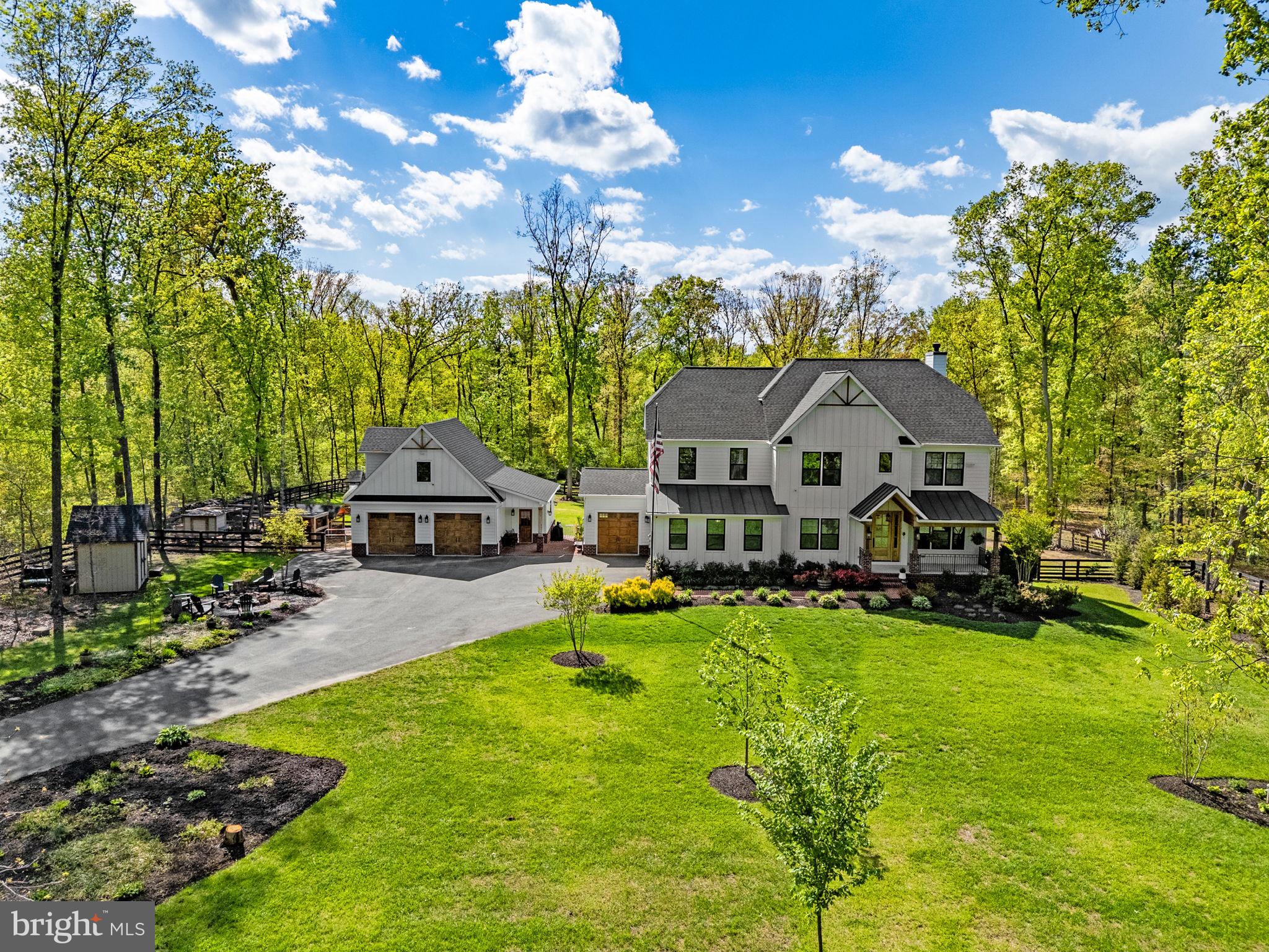 8794 Buckland Mill Road Gainesville, VA 20155 - Photo 1 of 67 Serene retreat in lush greenery.