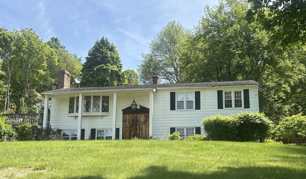 189 Scantic Road Hampden, MA 01036 - Photo 1 of 42 a view of house with a big yard and large trees
