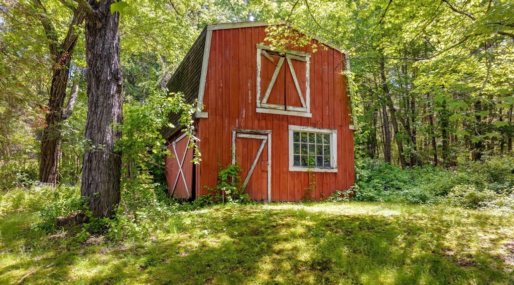 189 Scantic Road Hampden, MA 01036 - Photo 18 of 42 front view of house with a yard