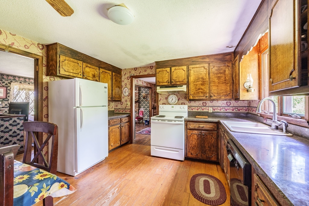 189 Scantic Road Hampden, MA 01036 - Photo 29 of 42 a kitchen with a refrigerator and a sink