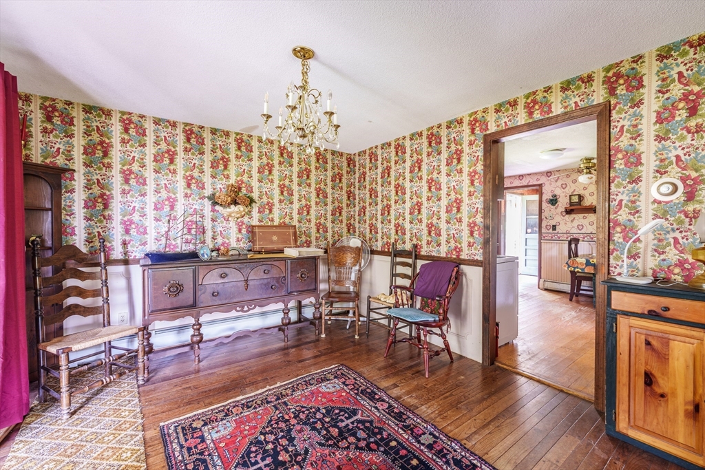 189 Scantic Road Hampden, MA 01036 - Photo 32 of 42 a living room with furniture and wooden floor