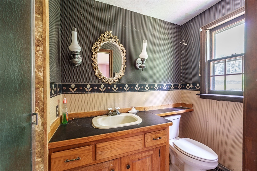 189 Scantic Road Hampden, MA 01036 - Photo 36 of 42 a bathroom with a sink and a mirror