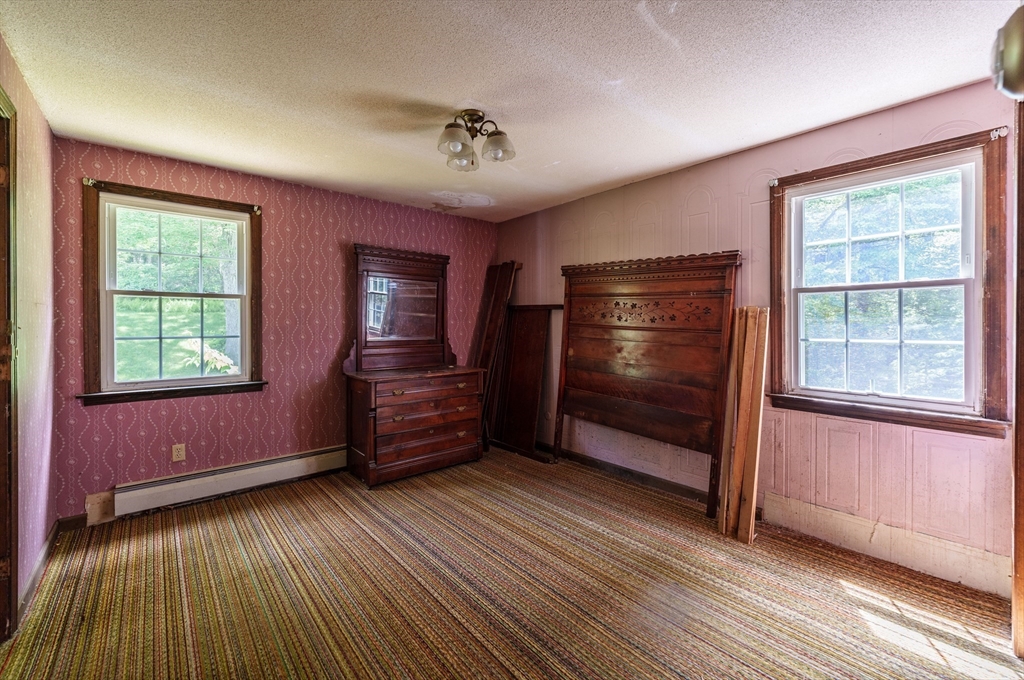 189 Scantic Road Hampden, MA 01036 - Photo 38 of 42 a room with wooden floor and window