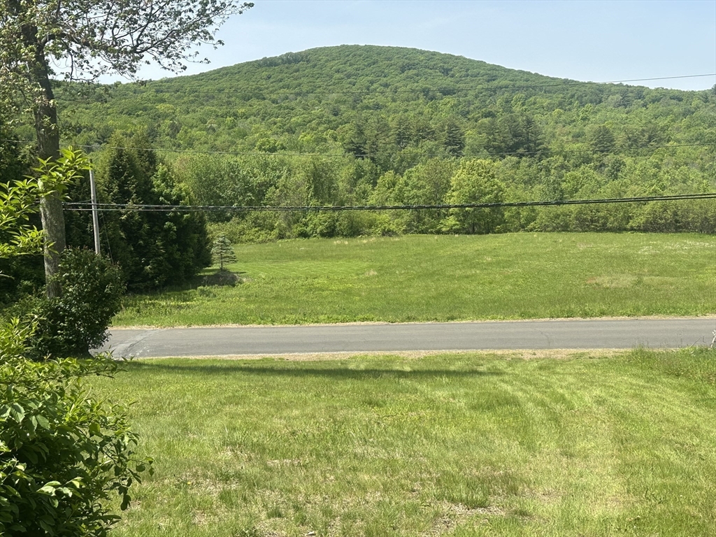 189 Scantic Road Hampden, MA 01036 - Photo 6 of 42 a view of a green field with clear sky