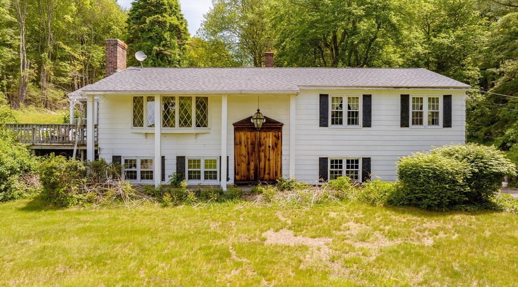 189 Scantic Road Hampden, MA 01036 - Photo 9 of 42 a front view of a house with swimming pool